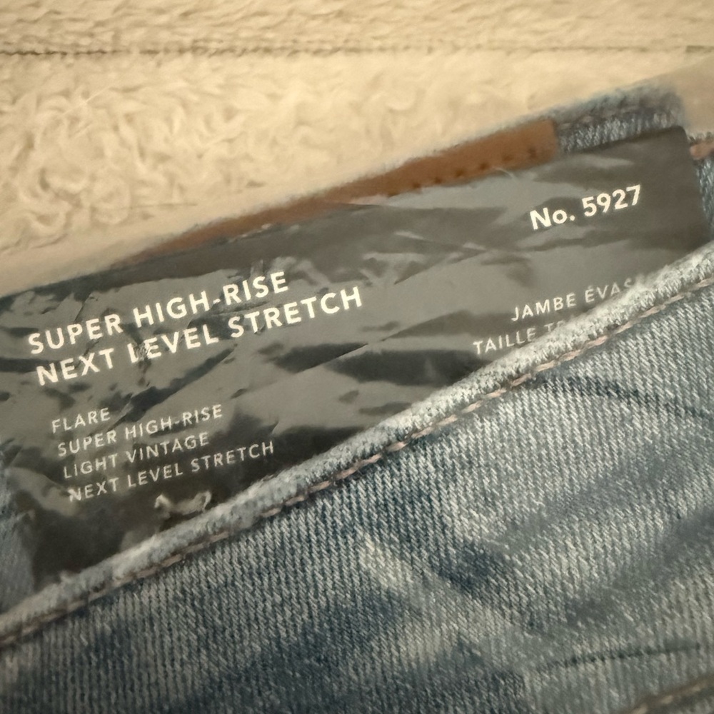 AE Next Level Ripped Super High-Waisted Flare Jean (Women’s) size 10 short NWT - Picture 9 of 11